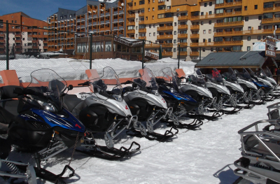 Snowmobiles parked in Val Thorens