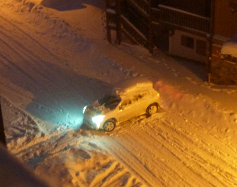 Snow-covered car in Val Thorens Snow-covered car in Val Thorens
